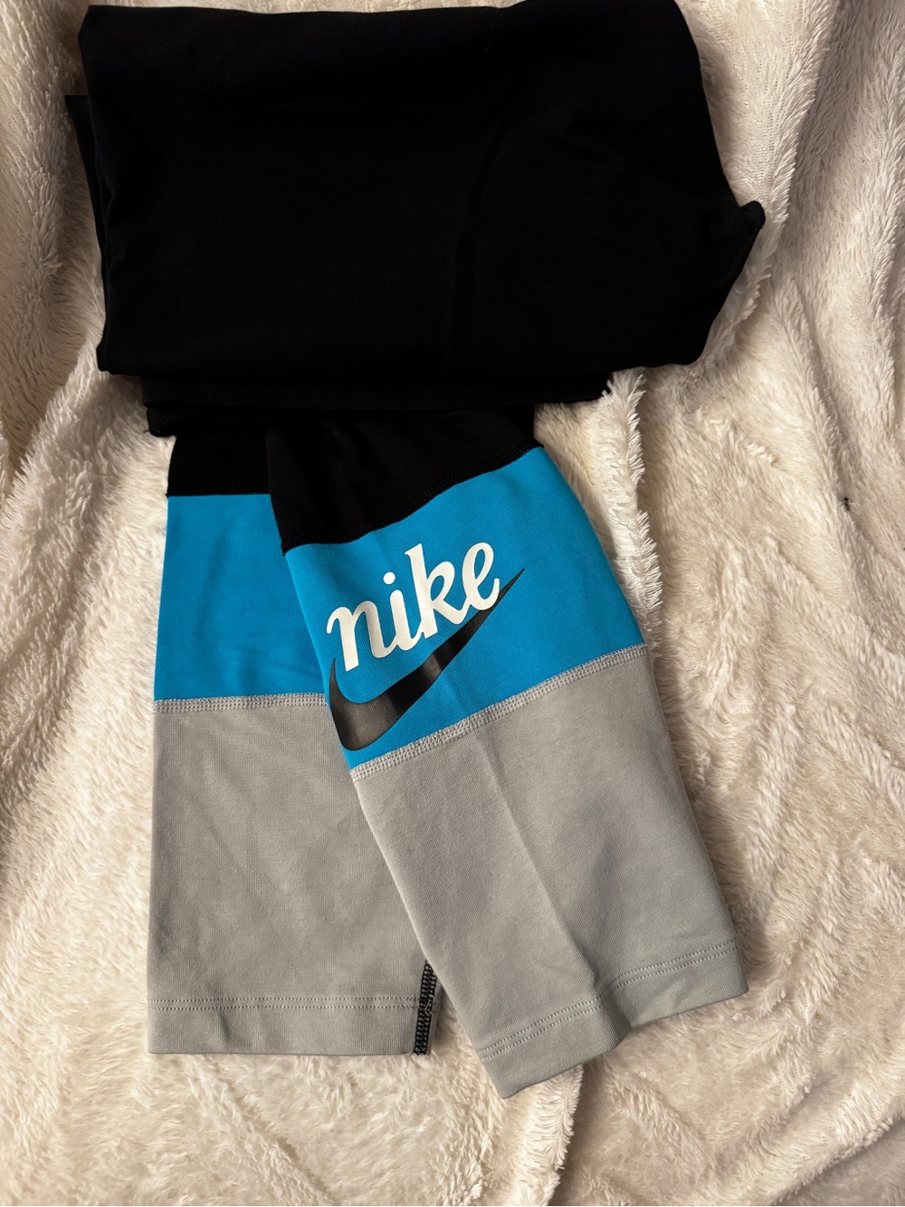 Nike Black Leggings with Bright Blue and Light Gray Lower Panels